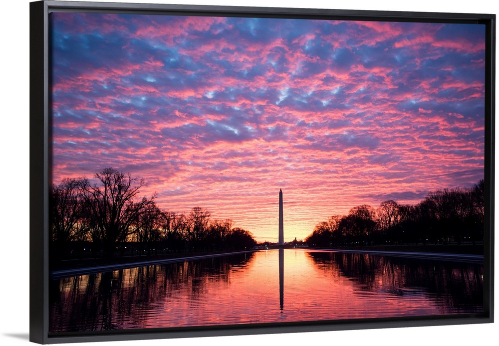 Vibrant clouds at sunset over the Washington Monument on the National Mall in Washington, DC.