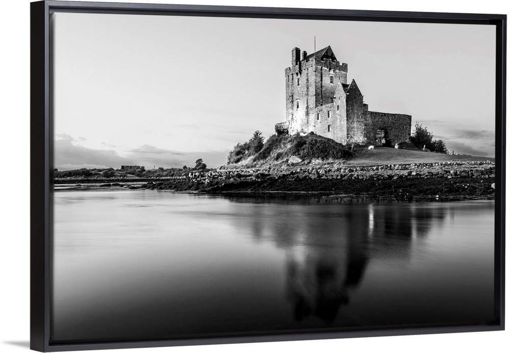 Black and White landscape photograph of the Dunguaire Castle reflecting into the water on the southeastern shore of Galway...