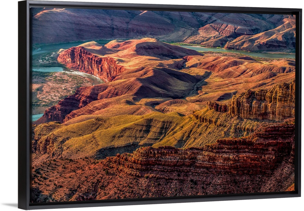 Landscape photograph of the Colorado River winding through the Grand Canyon.