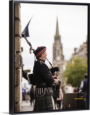 Man Playing Bagpipes
