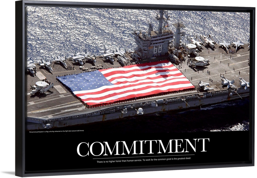 Inspirational Commitment print showing the flag of the United States of America stretched across the flight deck of the U....