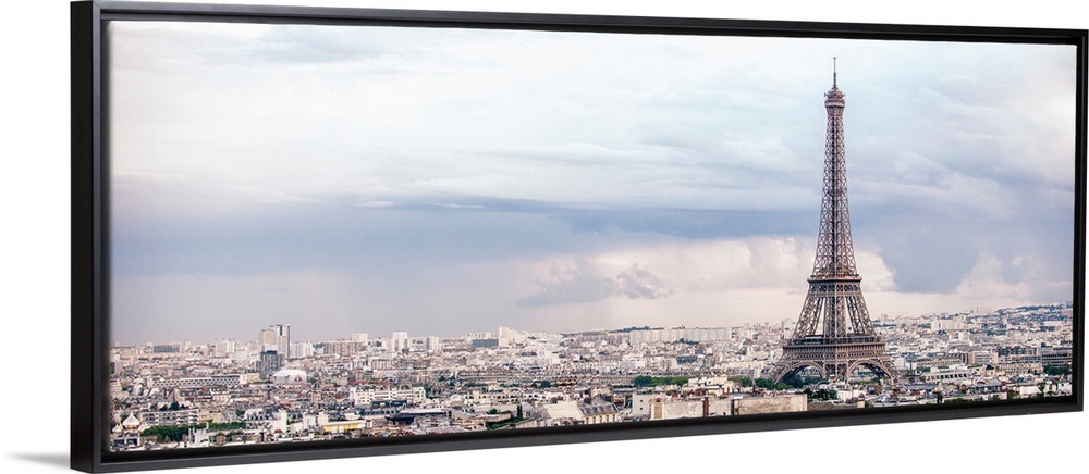Panoramic photograph of the city of Paris highlighting the Eiffel Tower.