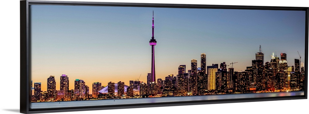 Photo of Toronto city skyline at night, Ontario, Canada.