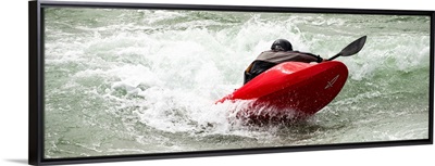 Panoramic View of Blue Kayaker paddling through Whitewater Rapids