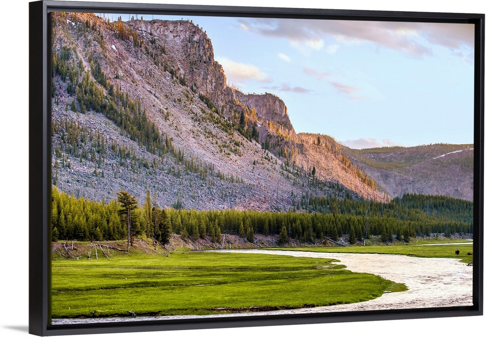 River flowing along the mountains in Yellowstone National Park in Wyoming.