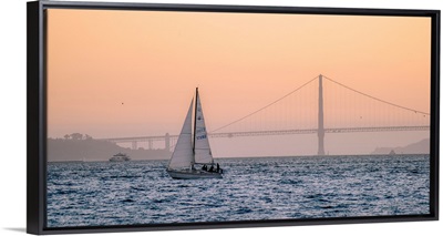 Sailboat Floats In Pacific With Golden Gate Bridge, San Francisco