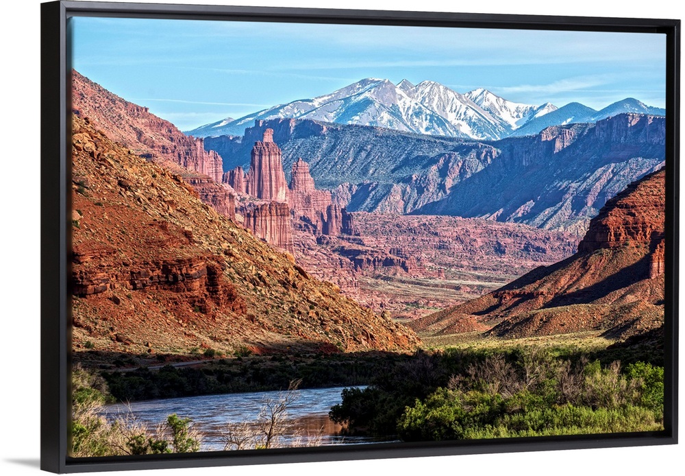 A river running through the Salt Valley of Arches National Park, with a view of the Fiery Furnace and the La Sal Mountains...