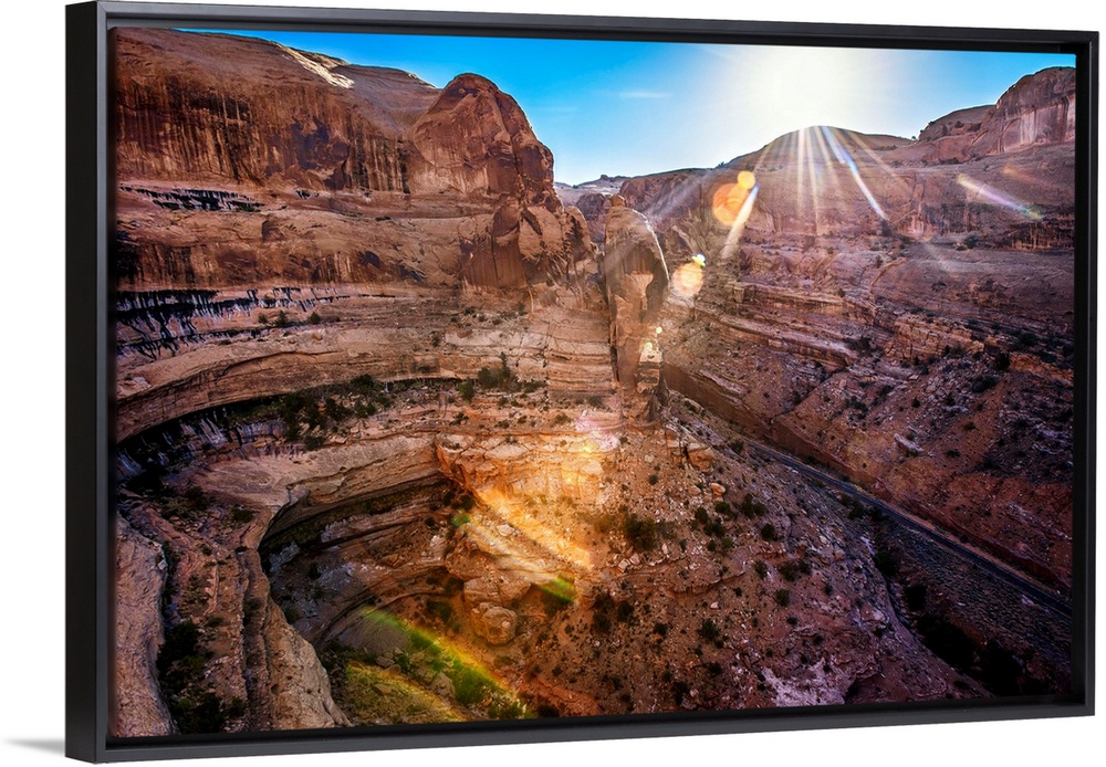 The sun shining on Shafer Canyon, Canyonlands National Park, Utah