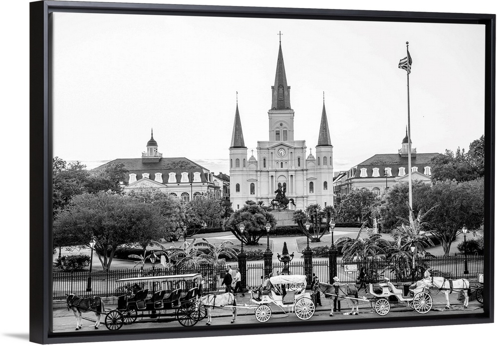 View of carriages stand in front of St. Louis Cathedral and Jackson Square in New Orleans, Louisiana.