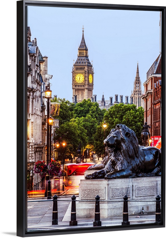 Photograph of Trafalgar Square with the iconic Trafalgar Lions in the foreground and Big Ben in the background.
