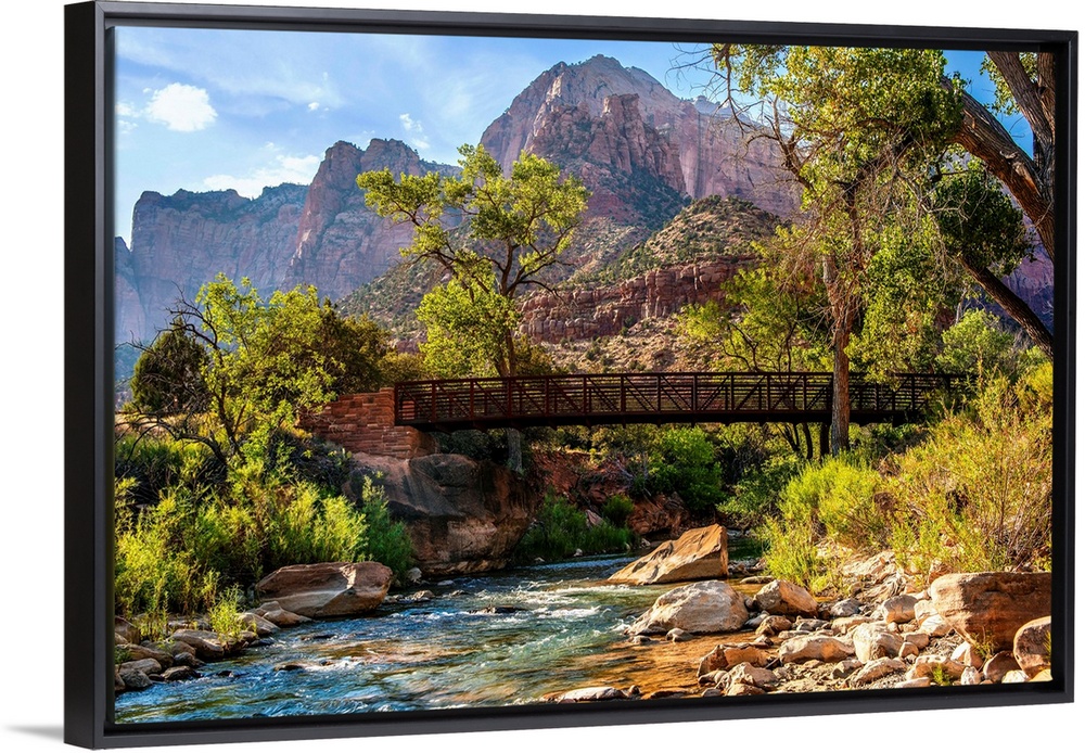 Landscape photograph of a pedestrian bridge over the Virgin River at Zion National Park, UT.