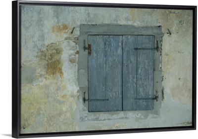 Detail of old blue shutters on a house in the Rhone Alpes in France, Europe