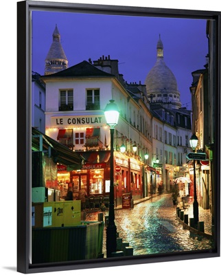 Rainy street and dome of the Sacre Coeur, Montmartre, Paris, France