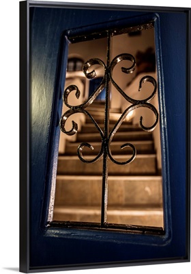 Staircase behind doors in Oia, Santorini, Greece