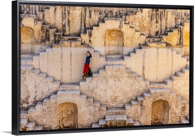Woman Carrying Jug Of Water At Stepwell In Jaipur, India