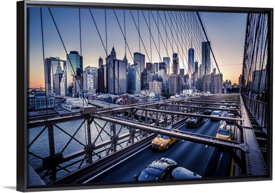 Cars Speeding At Sunset On Brooklyn Bridge