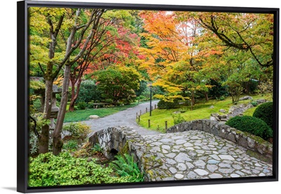 Fall Foliage and Stone Bridge in lush Garden