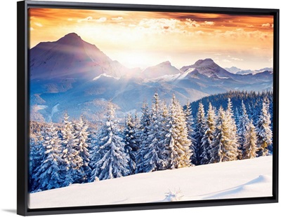 Fantastic evening winter landscape with dramatic overcast sky