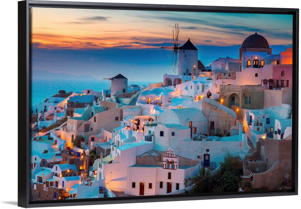 Lights of Oia village at night, Santorini, Greece.