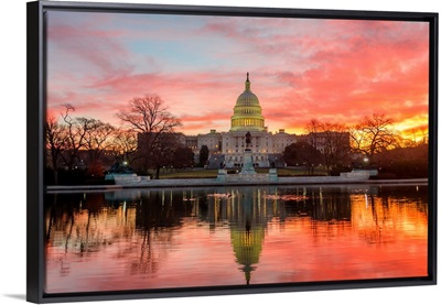 Washington DC, Capitol Building in a cloudy sunrise with mirrored reflection
