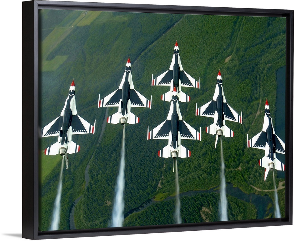 he Thunderbird aerial demonstration team performs a loop while in the Delta formation