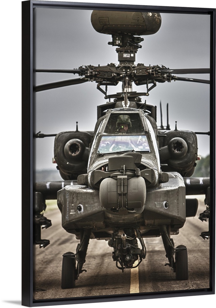 High dynamic range image of an AH-64 Apache helicopter on the runway during flight operations, Conroe, Texas.