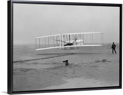 The first flight of the Wright Flyer in 1903