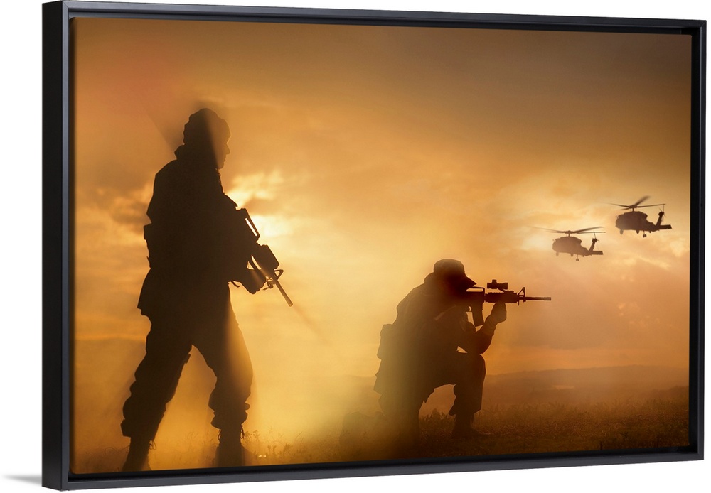 Large photograph depicts the silhouette of two United States military individuals securing a landing area for a couple cho...