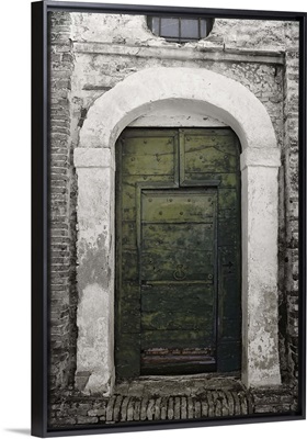 A green door Penne, a comune in the province of Pescara, Italy