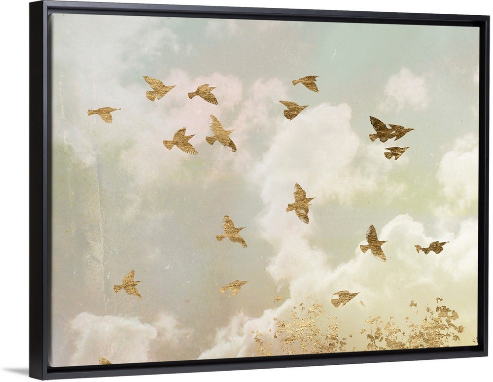 Gold birds in flight in a cloudy sky with bright sunlight.