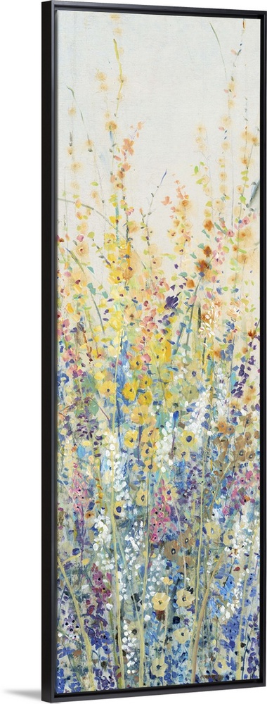 Vertical panel of blooming yellow and blue wildflowers in a field.