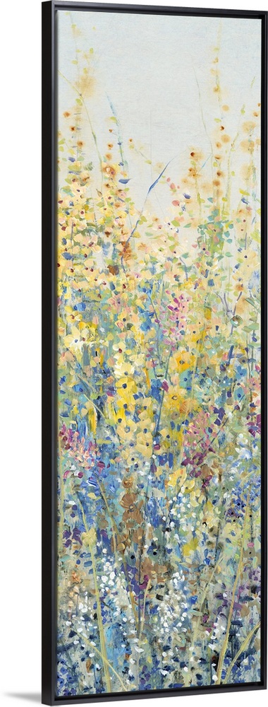 Vertical panel of blooming yellow and blue wildflowers in a field.