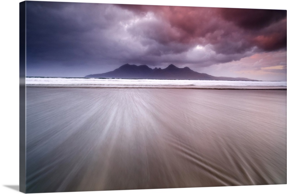 Pastel colored scene of a sandy beach in Scotland at low tide with dramatic stormclouds above.