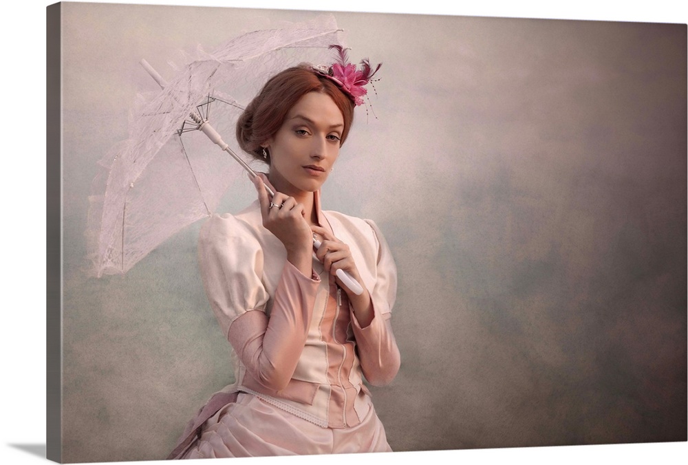 Portrait of a woman in a pink dress with a lacy parasol.