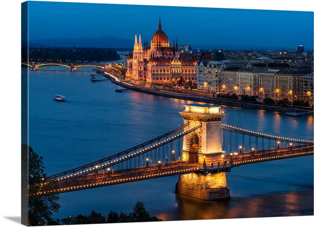 The beautiful Chain Bridge with the Hungarian Parliament in the background during blue hour.