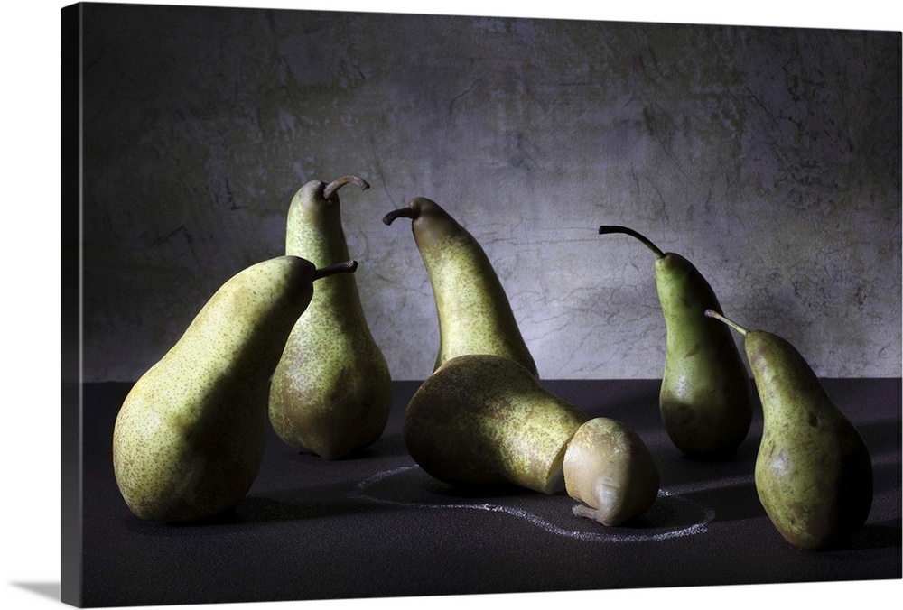Conceptual image of a group of pears appearing concerned over a sliced pear on the ground.