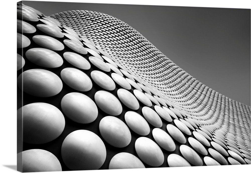 Circular panels on the curved facade of the Bull Ring in Birmingham, England.