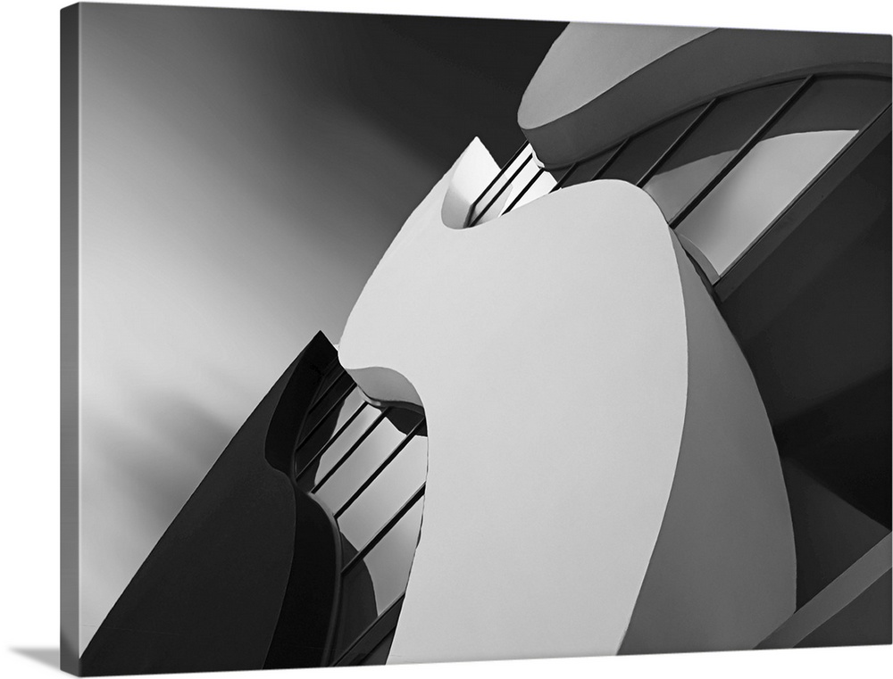 Abstract architectural photo of a unique curved design on a building, in black and white.