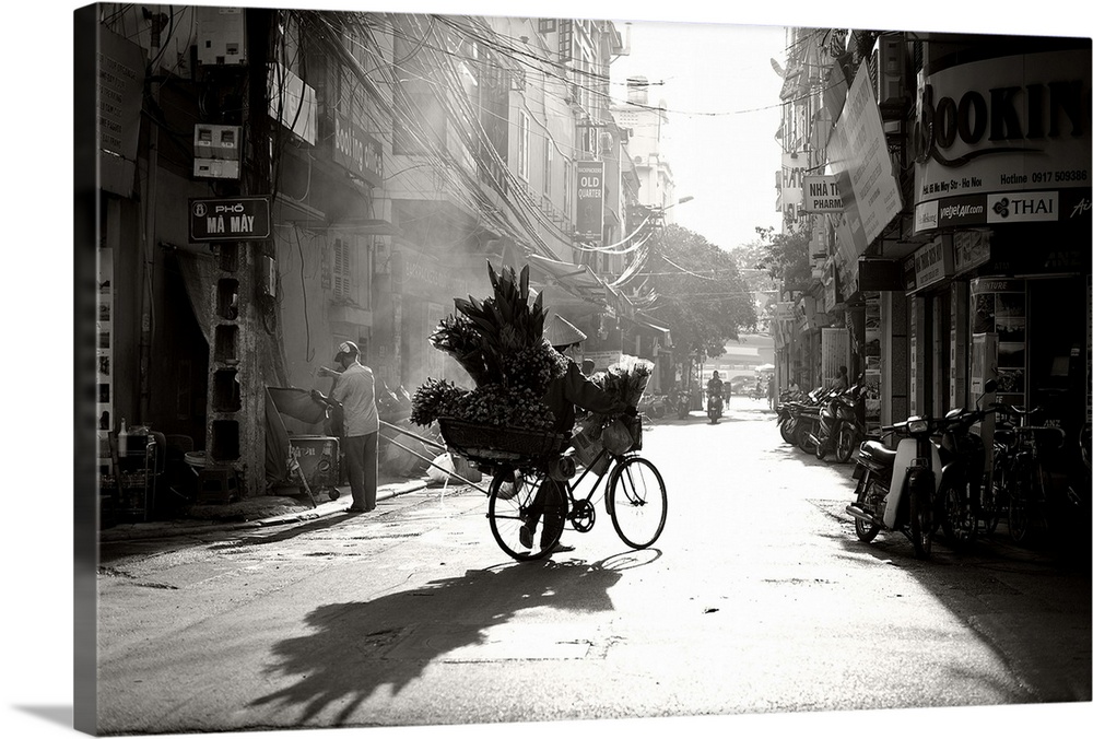 An early morning in the streets of a city in Vietnam.
