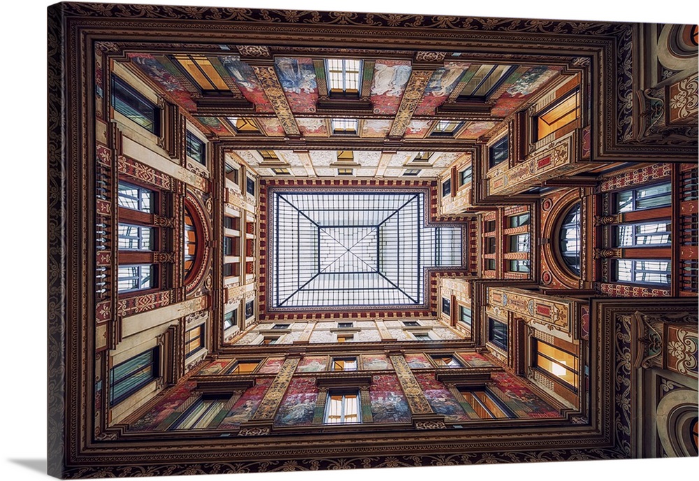 Architectural abstract photograph looking up towards the ceiling in Galleria Sciarra, highlighting all of the fine painted...