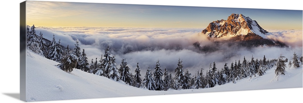 Panorama of Rozsutec in the clouds at sunset, Mala Fatra, Slovakia.