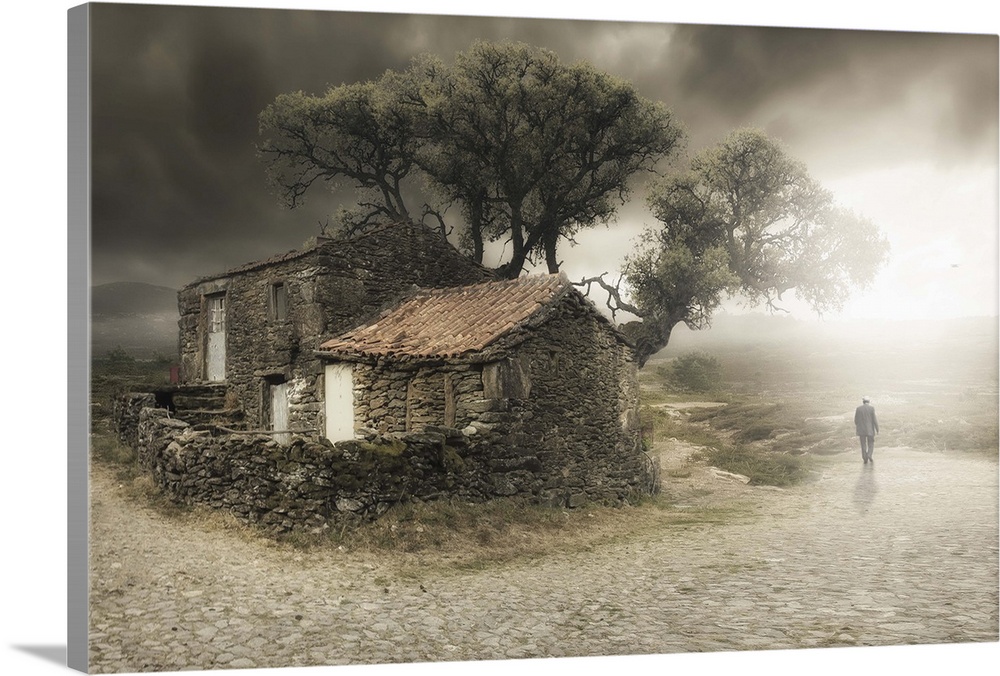 Conceptual photograph of a man walking away from a countryside cottage.