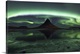 image thumbnail of Swirling and glowing northern lights above Kirkjufell Mountain in Iceland.