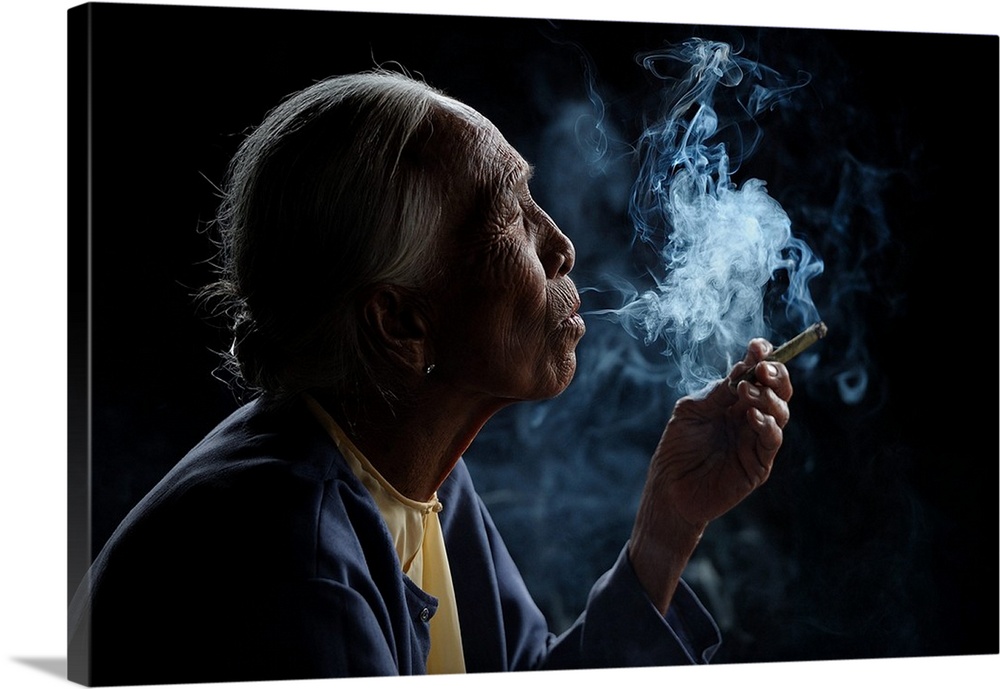 A profile portrait of an old woman with smoke pouring from her mouth.