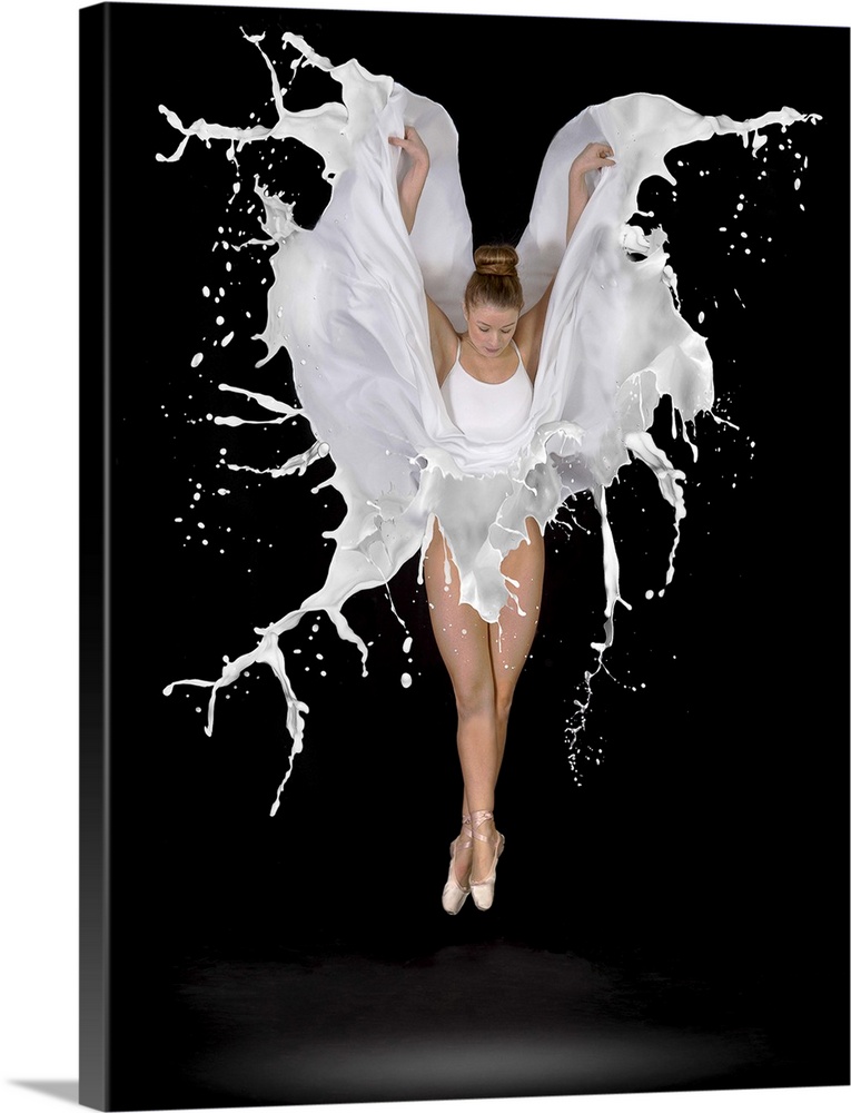 Conceptual image of a dancer leaping, her dress appearing to be made out of liquid.