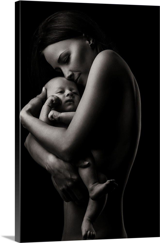 A fine art photograph of a woman holding her infant child lovingly.