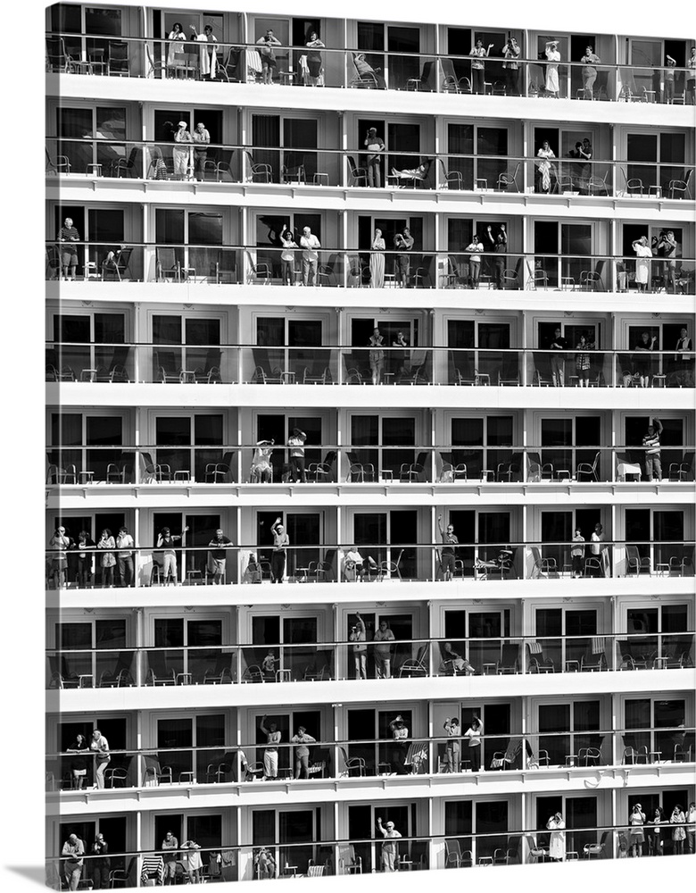 Several people sunning on balconies of a hotel in the summer.