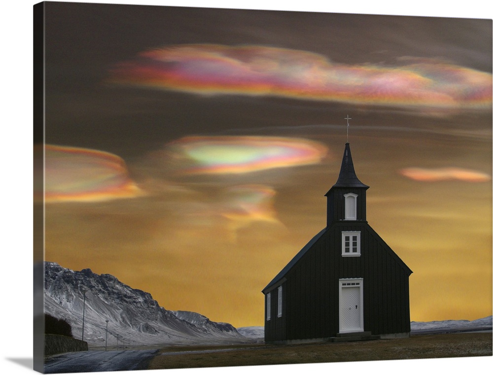 A church in Iceland with Polar stratospheric clouds, also known as nacreous clouds or "glitsky," which are clouds found in...