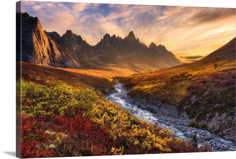 Beautiful sunset light and colorful tundra looking toward Tombstone Mountain during Autumn in the Ogilvie Mountain wildern...