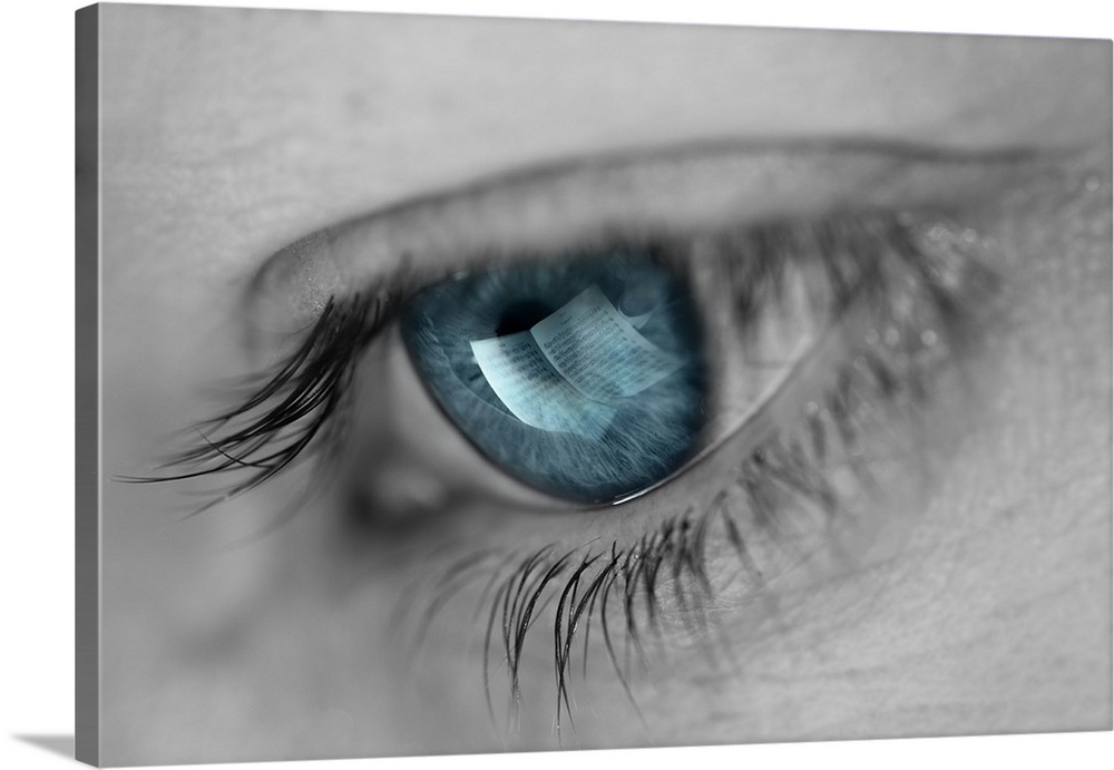 A woman's eye with a turquoise iris and a reflection of sheet music.